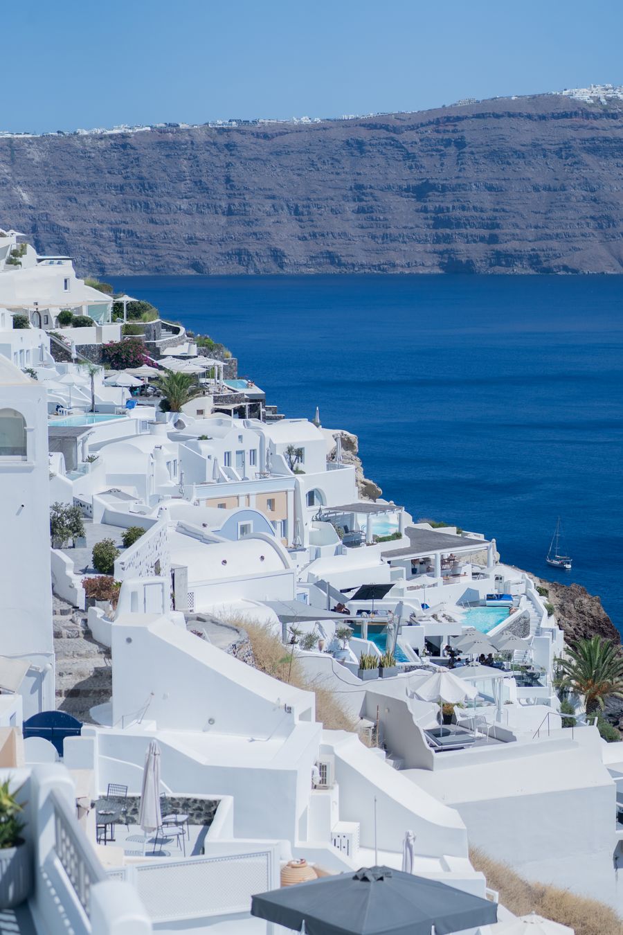 the white buildings of santorini greece — Día de mercado en Costa Rica: búscalo, tradúcelo, paga con el teléfono.