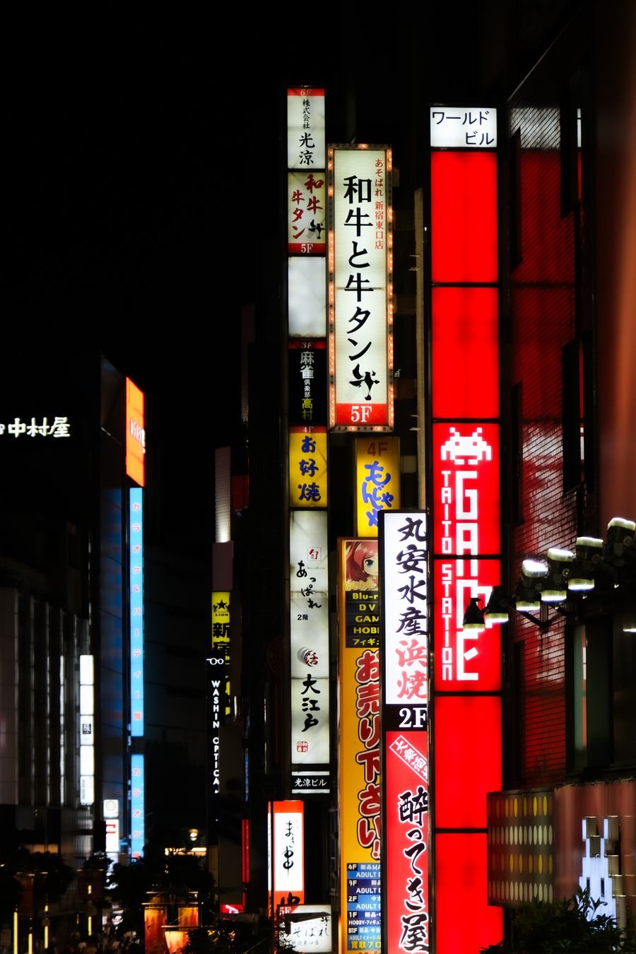 vibrant tokyo nightlife with neon signs — Island time, online time: ferries, beaches and full signal.