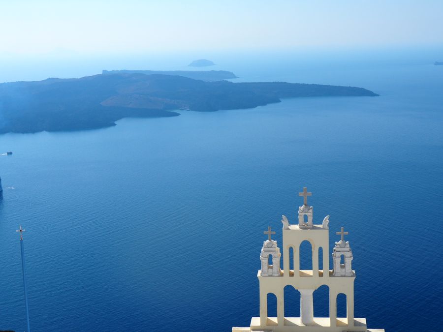 tower with crosses against island on lake — The capability matrix lists everything Resend eSIM QR Code does — no asterisks.