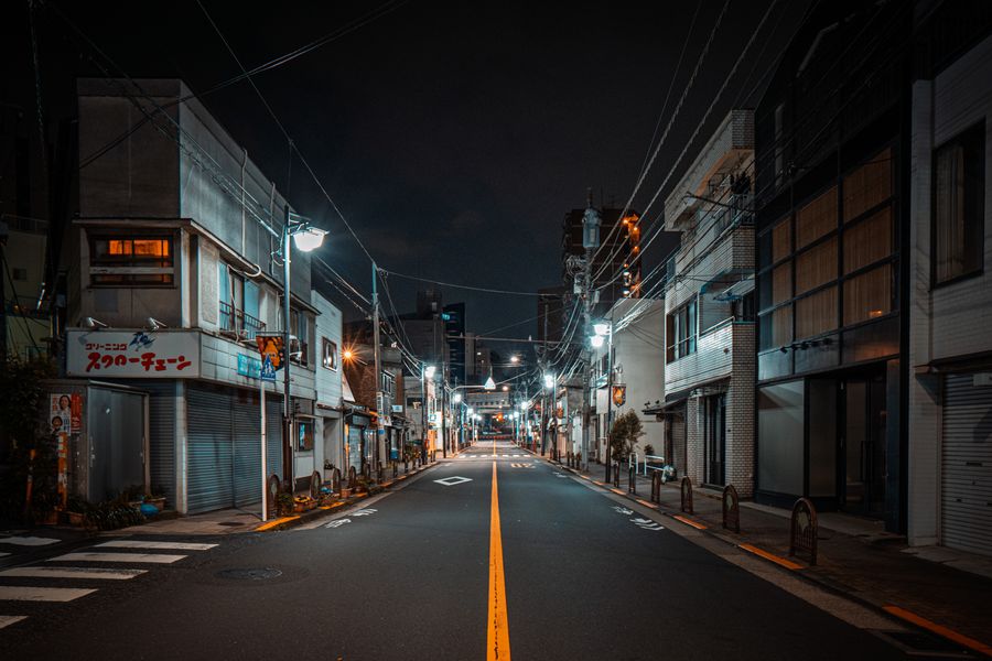 quiet night street scene in tokyo japan