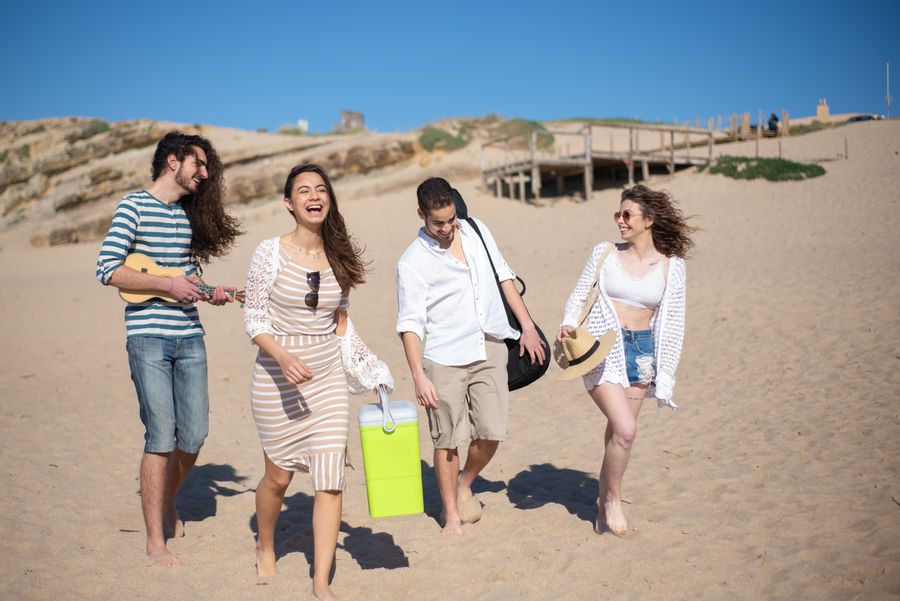 people walking on shore